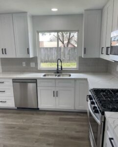 Newly remodeled kitchen with white cabinets